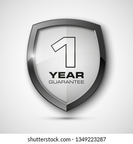 Steel Shield With Text Guarantee One Year Icon. Warranty 1 Year Label Obligations. Safeguard Metal Shield Sign. Protect Promise Reliability Badge. Security Guaranteed One Year Shield Illustration