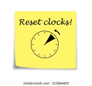 Sticky note reminder to set clocks back, black on yellow - Powered by Shutterstock