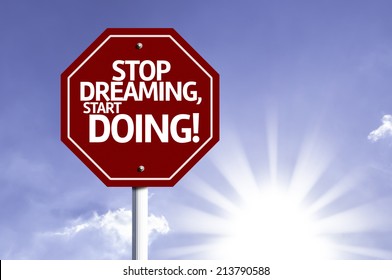 Stop Dreaming, Start Doing! red sign with sun background 
