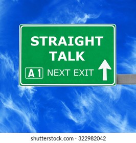 STRAIGHT TALK Road Sign Against Clear Blue Sky