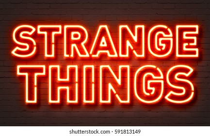 Strange Things Neon Sign On Brick Wall Background