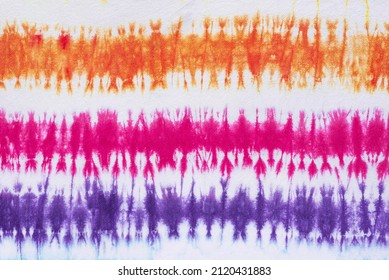 striped tie dye pattern on cotton fabric texture background.