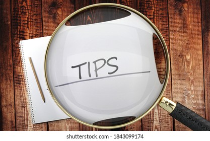 Study, learn and explore tips - pictured as a magnifying glass enlarging word tips, symbolizes analyzing, inspecting and researching the meaning of tips, 3d illustration