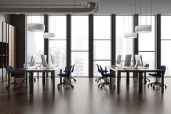 Stylish Coworking Interior With Chairs And Pc Desktop On Table, Brown Concrete Floor. Minimalist Office Workplace And Panoramic Window On Singapore Skyscrapers. 3D Rendering
