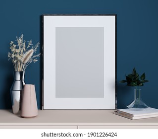 Stylish decorative set with silver frame for mockup, blue wall, pink shelf and plants, 3d rendering 