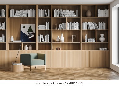 Stylish modern interior of contemporary library with comfortable armchair. Book with bookshelf. Wooden parquet floor. 3d rendering. - Shutterstock ID 1978811531