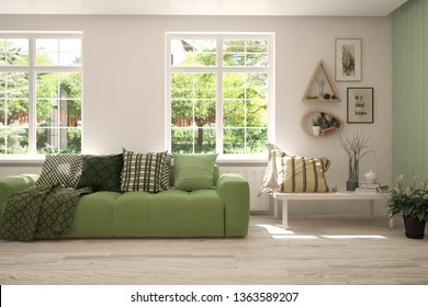 Stylish Room In White Color With Sofa And Summer Landscape In Window. Scandinavian Interior Design. 3D Illustration