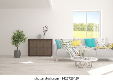 Stylish room in white color with sofa and summer landscape in window. Scandinavian interior design. 3D illustration - Shutterstock ID 1428728429