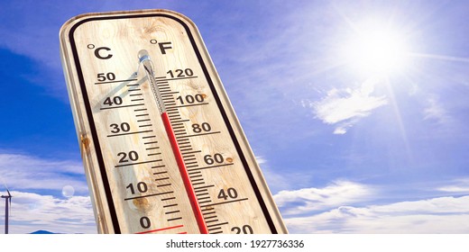 Summer heat, high temperature outdoors, hot desert weather. Thermometer reaching 100 degrees Fahrenheit scale on blue sky background, sunny day. 3d illustration