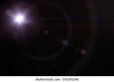 Sun flare, Space flare, Lens flare in the black background.