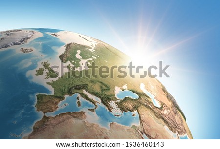 Sun shining over a high detailed view of Planet Earth, focused on Western Europe. 3D illustration - Elements of this image furnished by NASA Stock foto © 