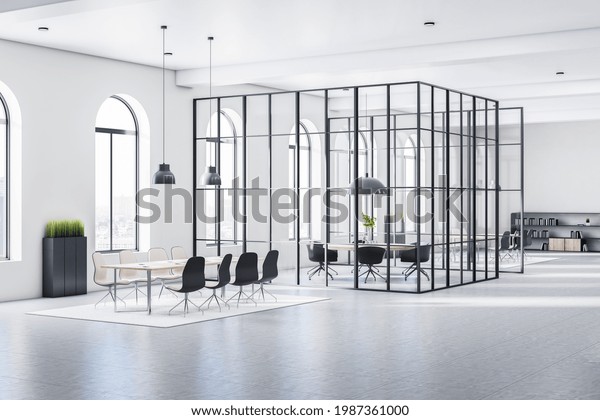 Sunny huge stylish open\
space office with arched windows, white walls, grey floor and\
conference room with transparent glass walls divided by black\
squares. 3D\
rendering