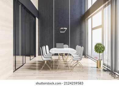 Sunny Modern Interior Design Background Of Stylish Meeting Room With Black Wall, White Glossy Conference Table On Golden Legs Surrounded By White Chairs, Wooden Floor, Golden Decoration Tree Pot