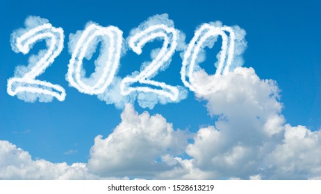 Sunny sky cloud year 2020. Happy New year concept. Numbers 2020 symbol inscription on background of blue sky from white smoke of clouds with bright sun.