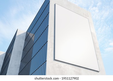 Sunny White Billboard With Copyspace On Concrete Wall Of Modern Skyscraper On Blue Sky Background. 3D Rendering, Mockup