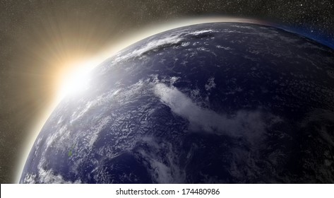 Sunset Over Pacific Ocean On Planet Earth Viewed From Space With Moon And Stars In The Background. Elements Of This Image Furnished By NASA.