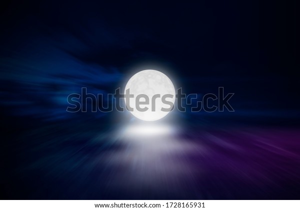 Super moon. a bright full moon and stars above the
land at night. Background to the tranquility of nature, outdoor at
night. motion blur
