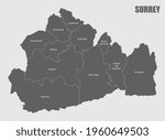 The Surrey county isolated map divided in districts with labels, England