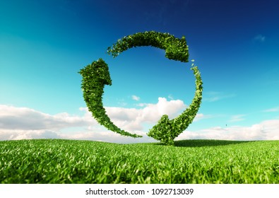 Sustainable development, eco friendly lifestyle concept. 3d rendering of arrow circle icon on fresh spring meadow with blue sky in background.