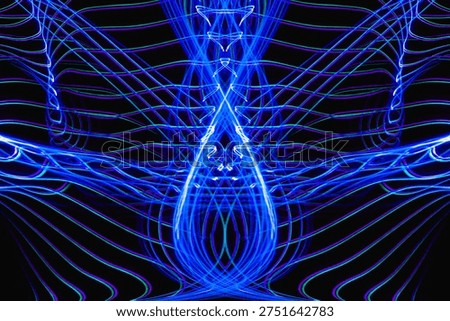 Symmetrical abstract waves with selective focus in blue and green light patterns. Abstract wave symmetry.