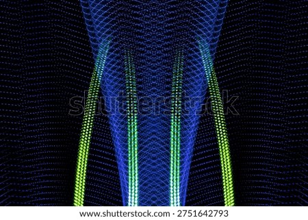 Symmetrical abstract waves with selective focus in blue and green light patterns. Abstract wave symmetry.