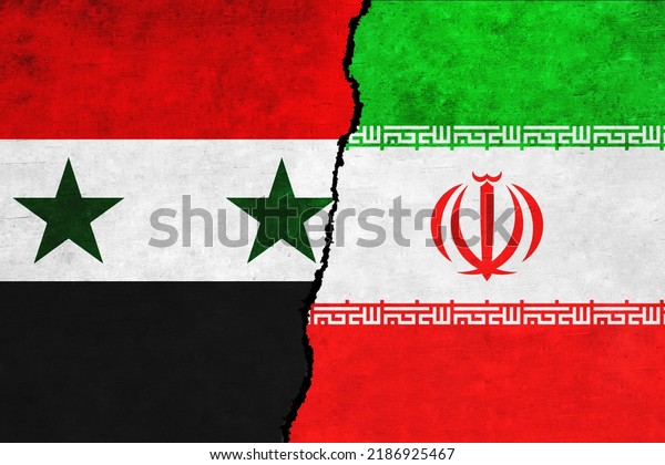 Syria and Iran\
painted flags on a wall with a crack. Syria and Iran relations.\
Iran and Syria flags\
together