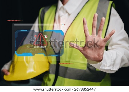System warning concept, engineer showing stop gesture with digital alert interface for security risk prevention, system failure control, and safety management awareness.