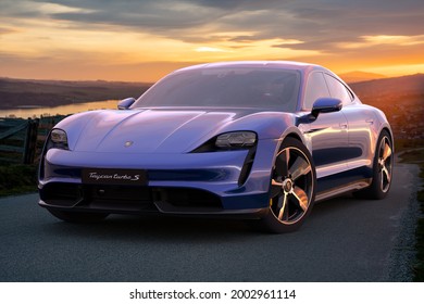 Szczecin, Poland-June 2021:Porsche Taycan - an all-electric sports car in a panoramic parking lot.3D illustration.