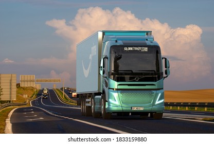 Szczecin,Poland-October 2020:Volvo electric truck with a trailer bearing the Amazon Prime logo ,3d illustration.