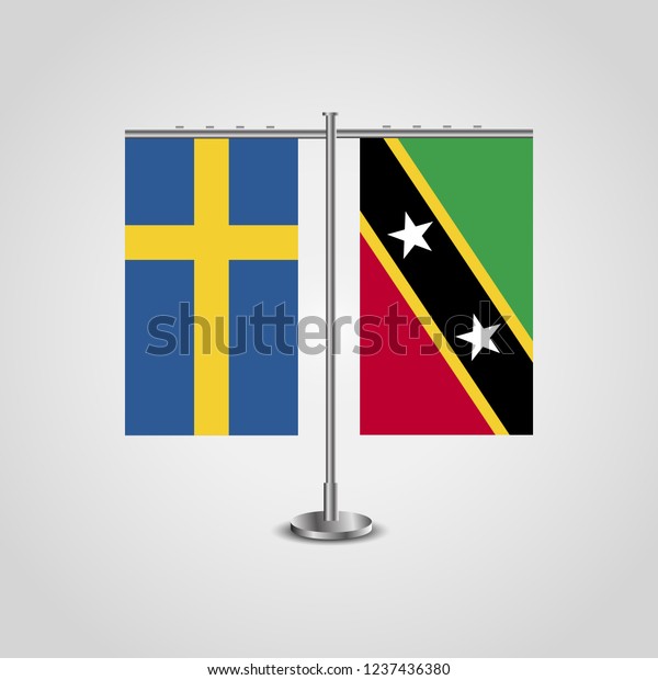 Table stand with flags of Sweden and Saint Kitts\
and Nevis.Two flag. Flag pole. Symbolizing the cooperation between\
the two countries. Table\
flags