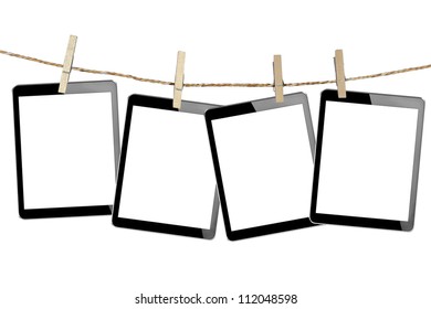 tablet computer pc in Wood clamps on white background + Clipping Path - Shutterstock ID 112048598
