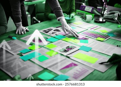 Teamwork. Hands pointing and organizing. Collaborative planning session. Collaboration in meeting room business strategy discussion. Business people working in office.