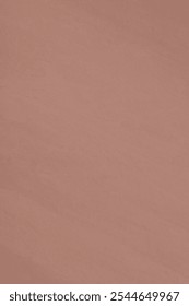 Terracotta background with a smooth texture. The background features a warm terracotta color, creating a cozy and earthy feel. Textured background. Terracotta background.
