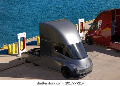 Tesla Semitruck Electric Trucks In Tesla Supercharger Charging .3D Illustration.