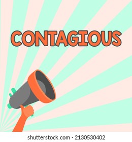 Text Caption Presenting Contagious. Business Idea Transmissible By Direct Or Indirect Contact With Infected Person Illustration Of Hand Holding Megaphone Making Wonderful Announcement.