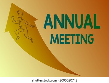 Text sign showing Annual Meeting. Word for scheduled annually for the discussion of the business future Illustration Of Happy Businessman Running Up With Arrow Got His Promotion. - Powered by Shutterstock