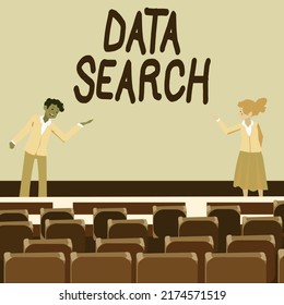 Text Sign Showing Data Search. Word Written On Gathers And Reports Information Contains Specified Terms Male And Female Colleagues Doing Presentation On Stage With Hand Gestures.