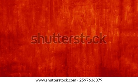 Texture of worn red paint on the wall. Metal plate covered with red paint.