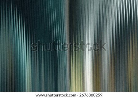 A textured abstract background with vertical lines and a gradient of teal, green, and gray colors, creating a sense of depth and movement