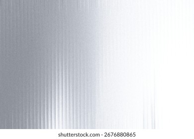 A textured metallic surface with vertical ribbed lines and a gradient from silver to white, creating a sleek and modern abstract background