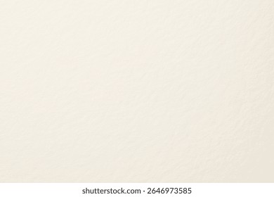 A textured, off-white background with a subtle, paper-like texture. The off-white background is ideal for minimalist designs. Beige textured background with copy space.