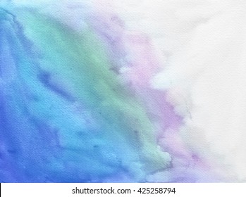 A Textured Watercolor Background Paper With Blue Green And Purple Color Paint Splashes And Fringing On White.