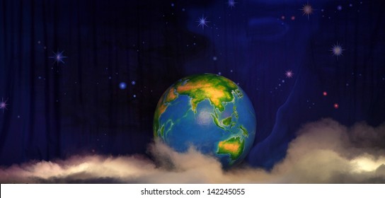 theatre backdrop featuring the earth in space