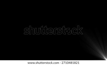 Thin white light rays with a subtle glow emanate from the bottom right corner against a solid black background.