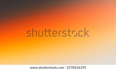 This abstract gradient background features vibrant hues of orange and yellow blending into gray, providing a striking visual for digital design, artwork, and creative projects.