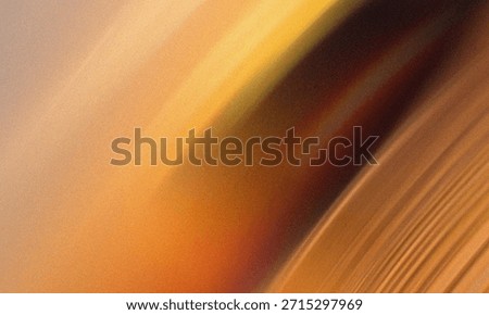 This abstract image features flowing, diagonal lines and soft gradients in warm tones of gold, orange, and brown. The composition evokes a sense of movement and depth.