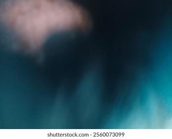 This background features deep blue and teal hues with hints of soft pink, creating a moody, atmospheric, and abstract aesthetic.