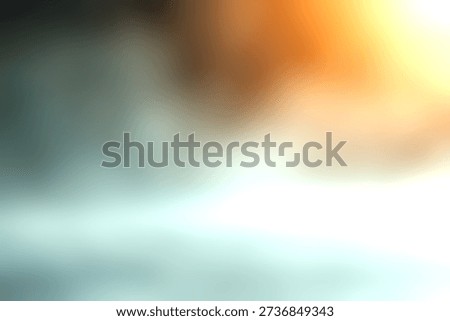 This captivating image features soft mist swirling in an ethereal atmosphere accentuated by warm orange light. Perfect for various creative projects.