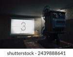 This captures an antique film projector in a dimly lit room, projecting a countdown on a vintage screen, enveloped by classic wallpaper and a hint of nostalgia.