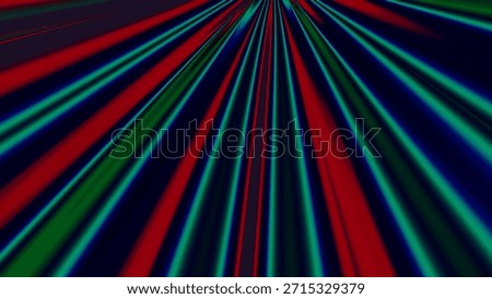 This image captures a mesmerizing display of colorful light rays emanating from a central point. The rays, painted in vivid hues of red, green, and blue, create a dynamic and captivating visual effect. The lights seem to radiate outward in a symmetrical pattern, creating a sense of depth and movement. The background is dark, which accentuates the brilliance and intensity of the light rays.